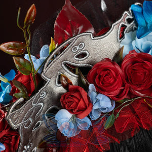 Identity V Little Girl cosplay headpiece close-up with embroidered fish ornament, red roses, and blue flower decorations