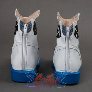 Rear view featuring back zippers, and the contrast of blue soles against white leather