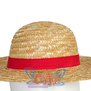 Close-up view of Luffy cosplay straw hat with wide brim and red band on a mannequin