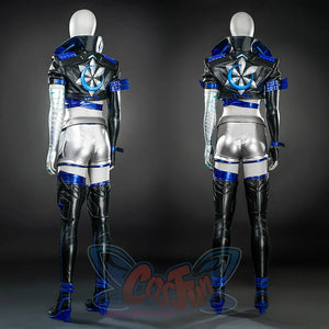 The back view reveals a black jacket with a unique blue and white flower-like emblem and structured blue decorations, complementing the silver shorts