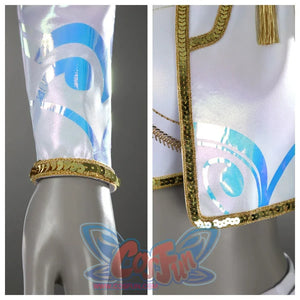 Presents a close-up of a sleeve with blue iridescent patterns and gold trim, plus the jacket’s edge showcasing the same trim and pattern details.