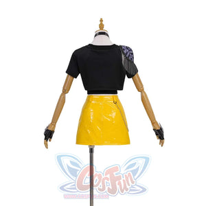 Reveals the back of Mira’s black cropped tee, showcasing the shoulder tassel design, and the yellow skirt’s sleek patent - leather back.