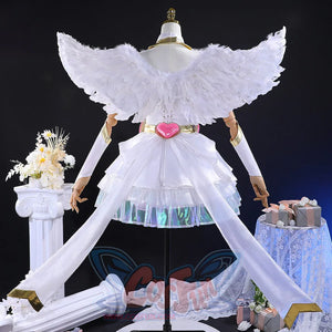 Back view of Panty cosplay costume showing white angel wings, layered skirt with holographic trim, and pink heart belt