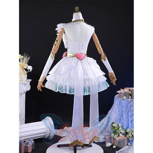 Rear view of Panty cosplay costume with folded wings, white layered skirt, pink bow belt, and golden arm bands