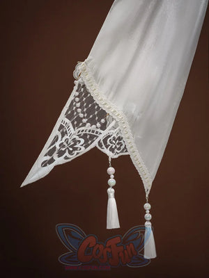 Ruan Mei cosplay costume white sleeve tip showing lace trim, pearl beads, and a delicate white tassel hanging from the cuff.