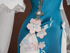 Ruan Mei cosplay costume skirt close-up with pink plum blossom appliques, Chinese knot clasp, white tassel, and lace trim.