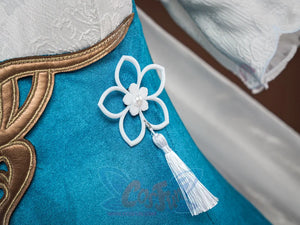 Ruan Mei cosplay costume white flower ornament with pearl center and white tassel against the teal bodice with gold trim.