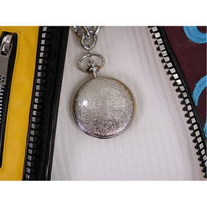 Rumi cosplay costume, silver metallic necklace with embossed design.