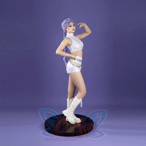 From the side, the glossy white sleeveless crop top and shorts of the Rumi costume are visible, along with the gold chain belt. White platform boots add edge to the sleek design.