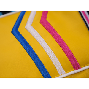 Rumi cosplay costume, there are three-color embroidered patterns on the sleeves.