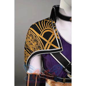 A close-up of the shoulder part of Sciel's cosplay costume, revealing the gold patterns and the detailed design on the black fabric.