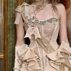 Elegant crystal fishbone corset evening dress with removable bow details and ruffled skirt design