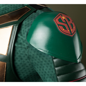 Green shoulder guards adorned with red and gold emblem patterns.