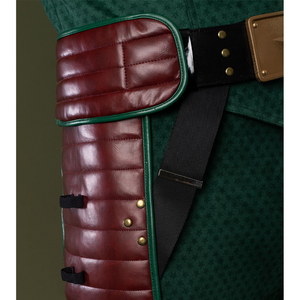 Pants mainly in dark green, accented with gold and reddish-brown tones.