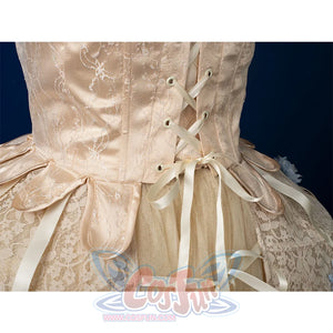 Enid Sinclair Gala dress back strap close-up with lace-up corset detail, cream ribbon ties, embroidered bodice, puff sleeves