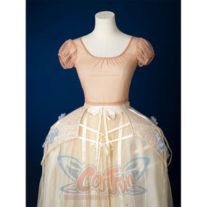 Enid Sinclair Gala dress top view with peach puff sleeves, scoop neckline, cream tulle skirt, ribbon bow waist detail