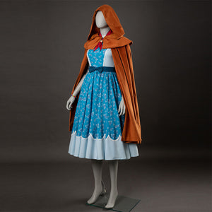 Holly cosplay side view with yellow-brown cloak, blue floral dress, white bodice, and light blue hem