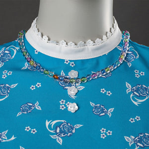 Wheeler cosplay costume neckline with white lace collar, colorful beaded necklace, blue floral bodice