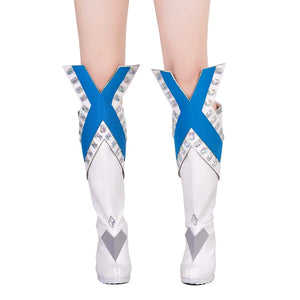 Close-up front display of Emma Frost cosplay boots, highlighting blue “X” straps, crystal accents, and silver geometric details on white high heels.