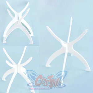 Close-up of white wig stand base components from multiple angles