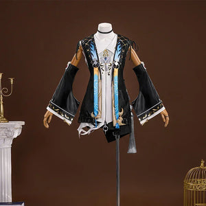 The jacket of Buling is black, with narrow sleeves at the top and wide sleeves at the bottom, The cuffs and collar of the jacket have delicate patterns and decorations, it is paired with a white lining, the details of the clothing include ribbons, tassels and pendants.