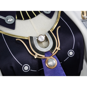 Mornye cosplay costume chest ornament detail featuring gold trim, silver gem, and purple accent