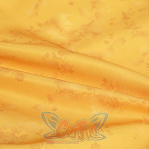 Judy yellow floral dress fabric close-up showing floral print pattern and texture