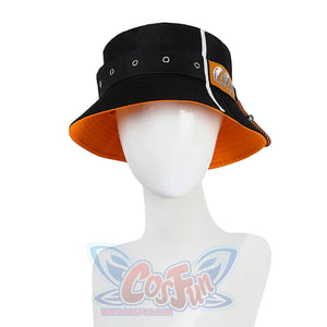 The bucket hat is a combination of black and orange, the hatband has silver metal eyelets with a drawstring for size adjustment, there is a orange label on the side of the hat.
