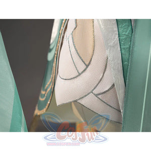 Zibai cosplay costume dress right side detail with beige fabric, teal trim, and silver stitching