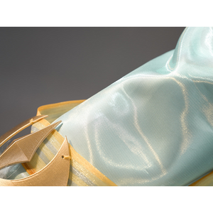 Zibai cosplay costume flowing sleeve fabric in light teal with subtle sheen and gold trim