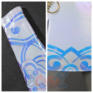 Presents the iridescent blue - purple patterns on Zoey’s sleeves and skirt hem, showcasing the intricate designs on the glossy fabric.