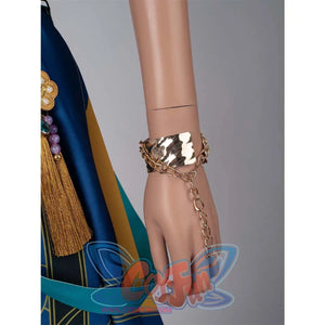 Close - up of a gold - toned chain bracelet with a wide cuff, worn on a mannequin’s hand as part of Zoey’s cosplay.