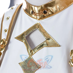 Focuses on the gold-trimmed neckline of Zoey’s top, featuring a geometric cut-out design and small chain accents, showcasing intricate front details.