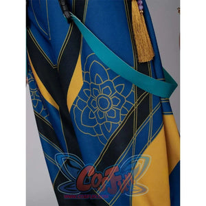 Close - up of blue - yellow pants with gold floral patterns and a turquoise suspender, from Zoey’s cosplay outfit.