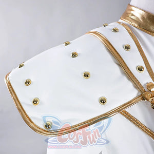 Highlights the gold - trimmed shoulder pads of Zoey’s jacket, adorned with metal studs, emphasizing the costume’s structured and decorative shoulders.