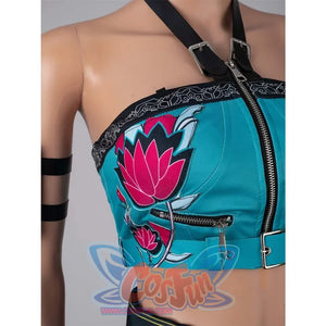 Extreme close - up of the Zoey cosplay crop top, emphasizing the pink floral design, zippers, and decorative elements.