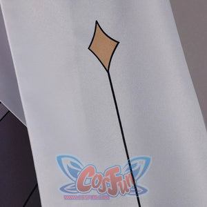 Close-up of Genshin Impact Aether cosplay costume sleeve with white fabric, gold diamond motif, and black line detail
