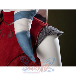 Ahsoka Tano cosplay headpiece detail layers striped fabric beside a gray shoulder guard.