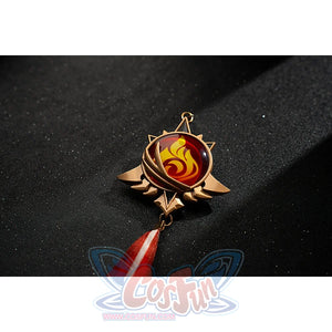 Genshin Impact Amber cosplay Pyro vision close-up centers a red flame emblem in a gold-tone frame.