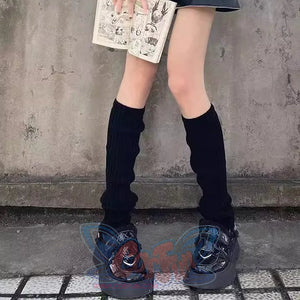 Black ribbed scrunched leg warmers 50cm length styled with blue transparent platform shoes