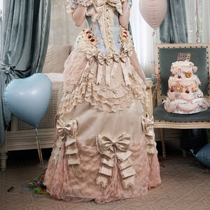 COSFUN front view of a cream Rococo Lolita bustle skirt with layered lace and bow accents