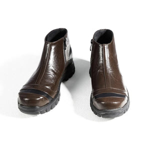 COSFUN Captain Steve Rogers cosplay boots centers brown ankle boots above rugged black soles.