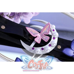 Close-up of Castorice cosplay costume belt with pink butterfly, white crescent charm, pearl beads, and black strap