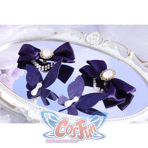 Flat lay of Castorice cosplay costume bow accessories with purple ribbons, pearl chains, and white butterfly accents