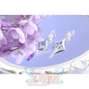 Flat lay of Castorice cosplay costume earrings with silver wing shapes, pearl beads, and purple teardrop charm