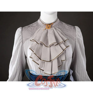Close-up of Maelle cosplay costume from Clair Obscur Expedition 33 showing gray ruffle blouse and gold neck badge