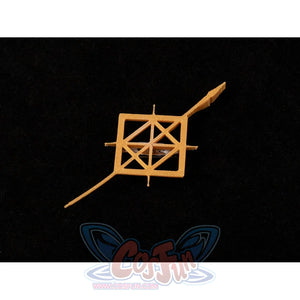 Badge close-up of Maelle cosplay costume from Clair Obscur Expedition 33 showing gold geometric pin on black fabric