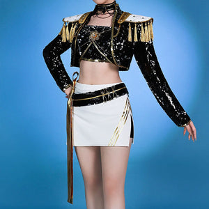 Mira cosplay costume with black top featuring golden tassels and sequins, floral gold plate design at the center, paired with white skirt accented in black and gold.
