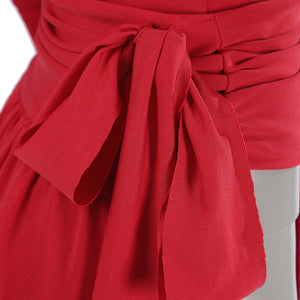 Elektra Natchios cosplay costume waist wrap ties securely into a large knot to shape the red stretch fabric garment piece.