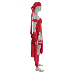 Elektra Natchios cosplay costume gathers red fabric in a side profile view that anchors the wrap and long head scarf ties.